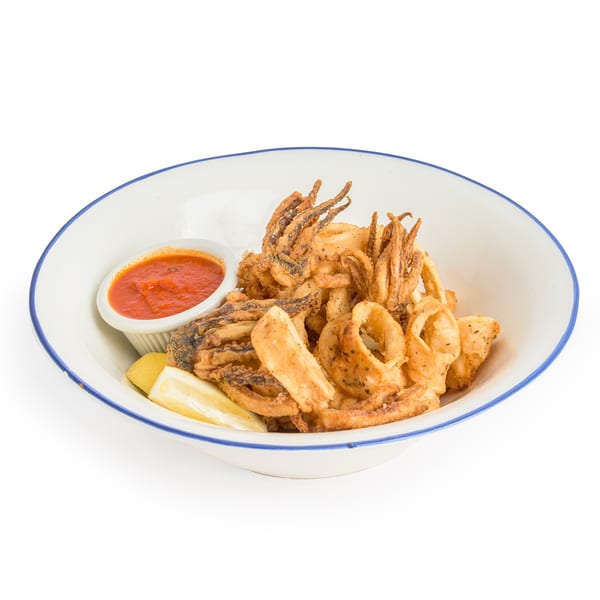 Alba's Pizzeria & Restaurant's fried calamari with marinara sauce and lemon wedges in a white bowl.