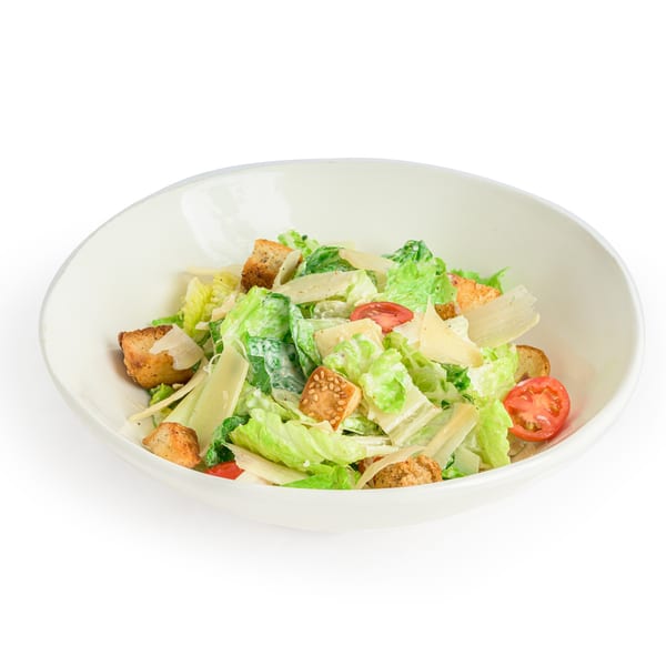 Alba's Pizzeria & Restaurant Caesar salad with romaine lettuce, croutons, parmesan, and cherry tomatoes.